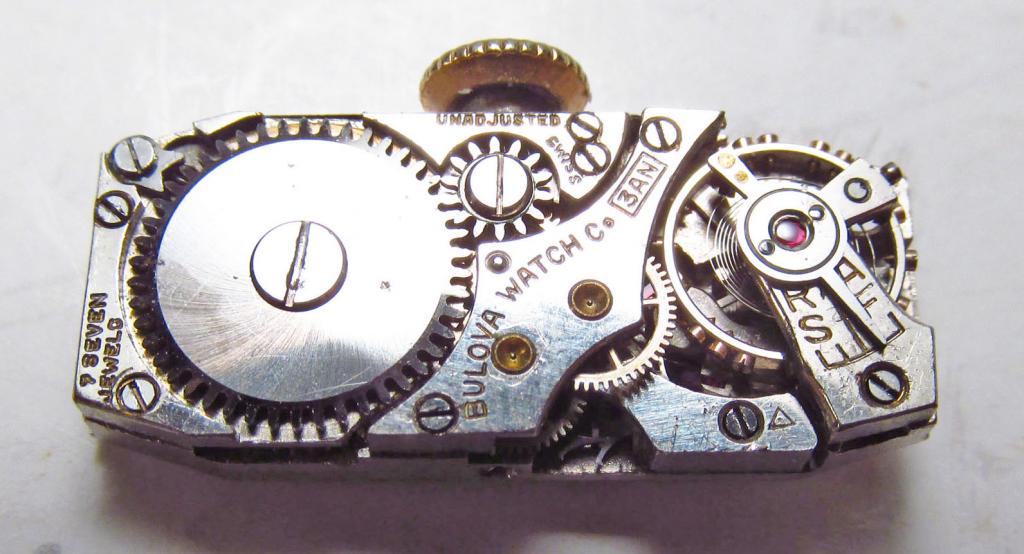 Movement 3AN, triangle pictomark date code for 1935, 7 jewels.